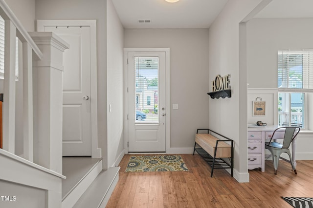 1006 Whistler St, Durham, NC 27713 - entryway with wood finished floors and baseboards