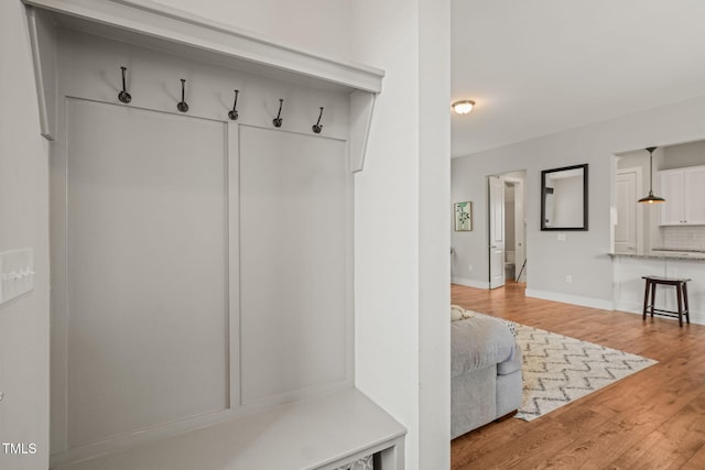 1006 Whistler St, Durham, NC 27713 - mudroom with wood finished floors and baseboards