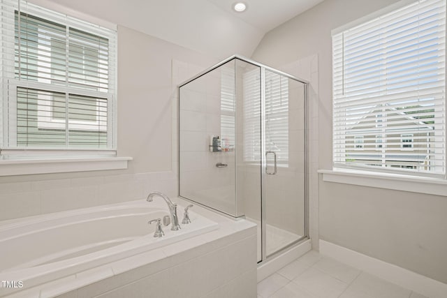 1006 Whistler St, Durham, NC 27713 - bathroom with a garden tub, a shower stall, and tile patterned floors
