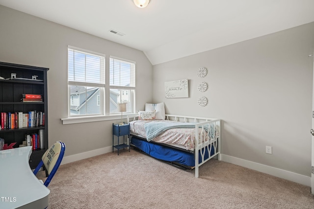1006 Whistler St, Durham, NC 27713 - carpeted bedroom with baseboards and vaulted ceiling