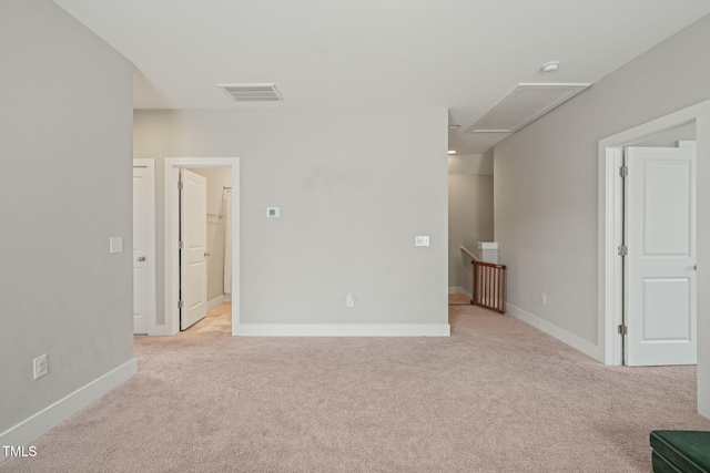 1006 Whistler St, Durham, NC 27713 - unfurnished living room featuring light colored carpet and attic access