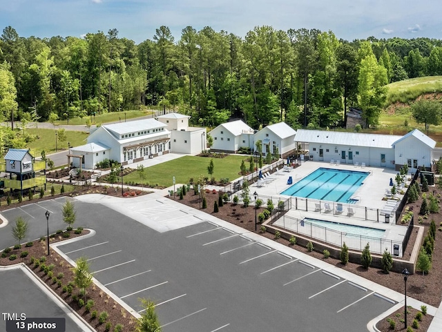 1006 Whistler St, Durham, NC 27713 - drone / aerial view of a pool and a forest