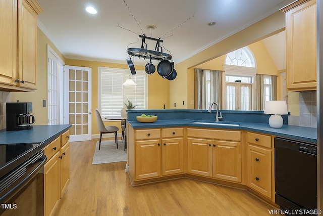 1016 Pasture View Ln, Raleigh, NC 27603 - kitchen featuring black dishwasher, ornamental molding, dark countertops, light wood-style floors, and electric range oven