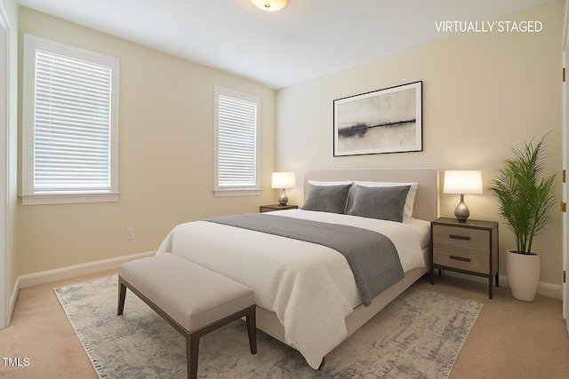 1016 Pasture View Ln, Raleigh, NC 27603 - bedroom with light colored carpet and multiple windows