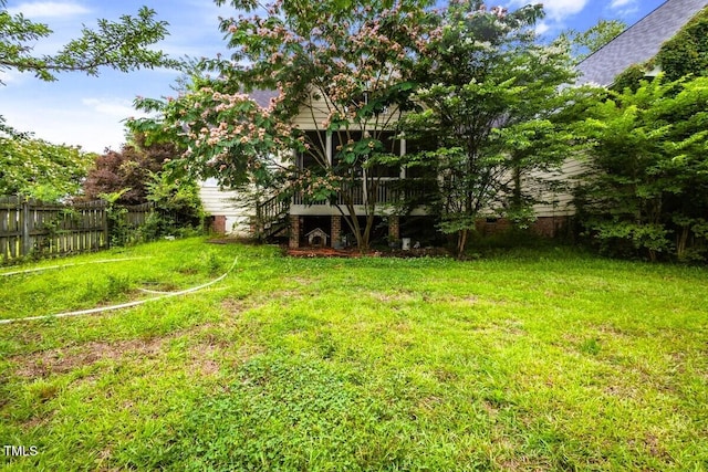 1016 Pasture View Ln, Raleigh, NC 27603 - view of yard featuring a wooden deck