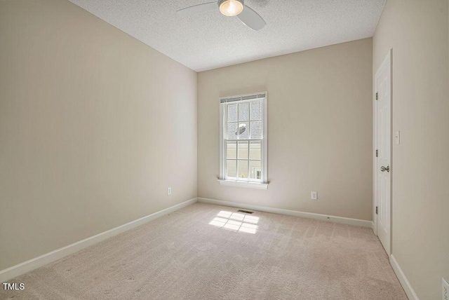 125 Chimney Rise Dr, Cary, NC 27511 - unfurnished room featuring ceiling fan, carpet flooring, and a textured ceiling