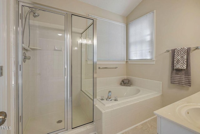 125 Chimney Rise Dr, Cary, NC 27511 - full bath with a bath, a stall shower, vaulted ceiling, and vanity