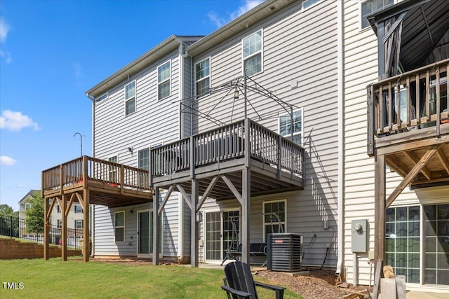 333 Amber Acorn Ave, Raleigh, NC 27603 - back of house featuring a lawn, a wooden deck, and a balcony
