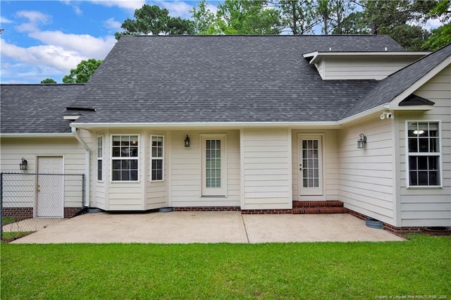 4010 Arcadia Ct, Fayetteville, NC 28311 - back of property with a patio area and a shingled roof
