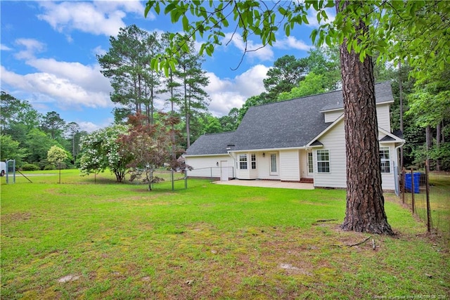 4010 Arcadia Ct, Fayetteville, NC 28311 - back of property with a patio and roof with shingles