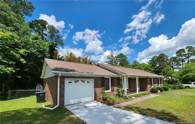 1519 Palmer Dr, Fayetteville, NC 28303 - single story home featuring a garage, brick siding, and concrete driveway