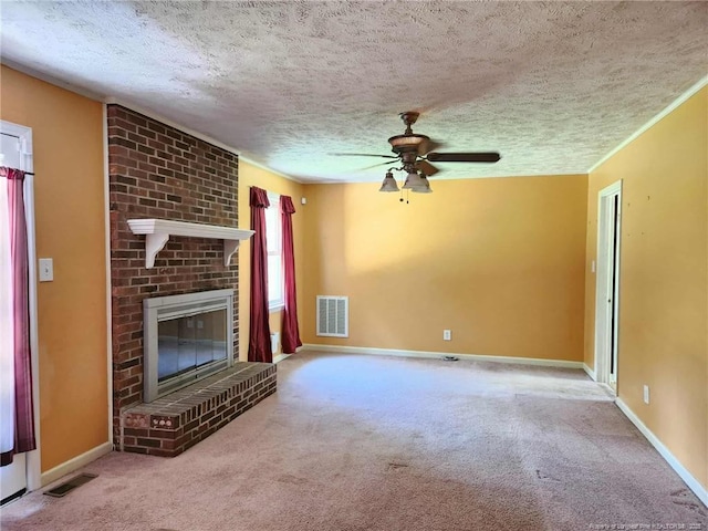 1519 Palmer Dr, Fayetteville, NC 28303 - unfurnished living room featuring a textured ceiling, carpet flooring, ceiling fan, and a brick fireplace