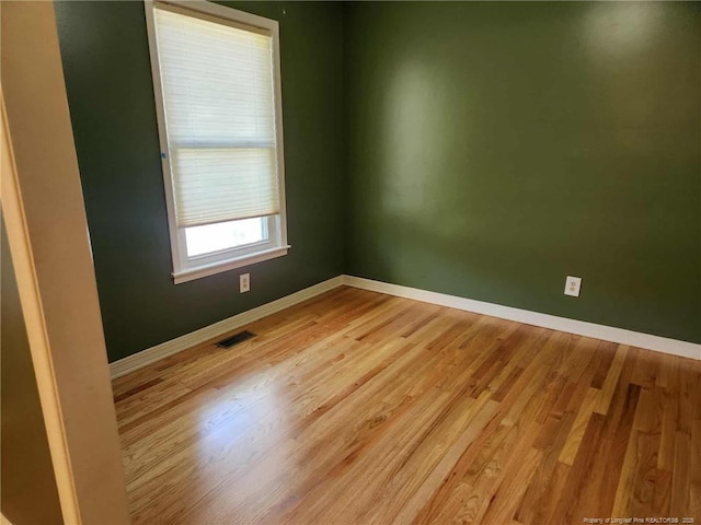 1519 Palmer Dr, Fayetteville, NC 28303 - spare room with light wood-style floors and baseboards