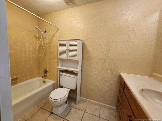 1519 Palmer Dr, Fayetteville, NC 28303 - full bath with a textured wall, tub / shower combination, tile patterned flooring, vanity, and a textured ceiling