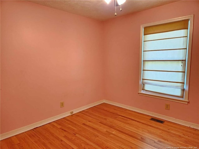 1519 Palmer Dr, Fayetteville, NC 28303 - spare room featuring light wood-style flooring and healthy amount of natural light