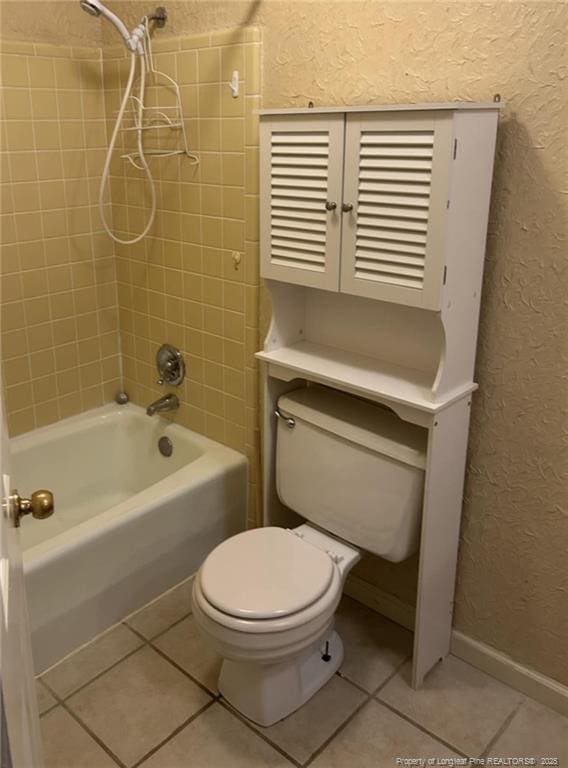 1519 Palmer Dr, Fayetteville, NC 28303 - full bath with a textured wall, tile patterned floors, and shower / bathtub combination