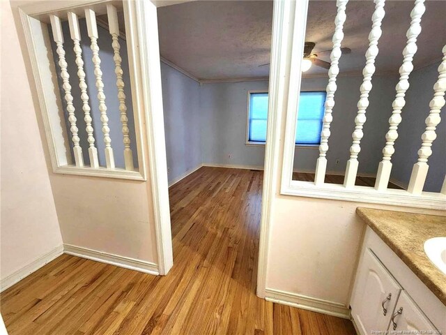 1519 Palmer Dr, Fayetteville, NC 28303 - corridor with crown molding and light wood-style floors