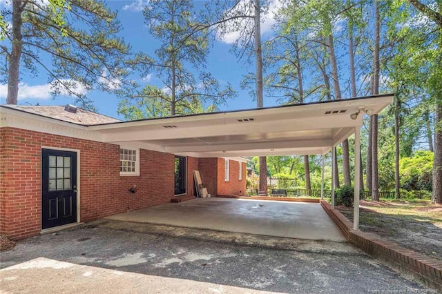 2613 N Edgewater Dr, Fayetteville, NC 28303 - view of parking / parking lot with an attached carport