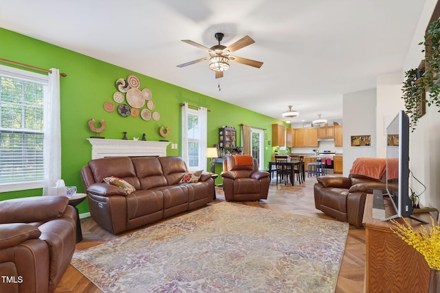 1205 Magnolia Hill Rd, Garner, NC 27529 - living area with a ceiling fan and healthy amount of natural light