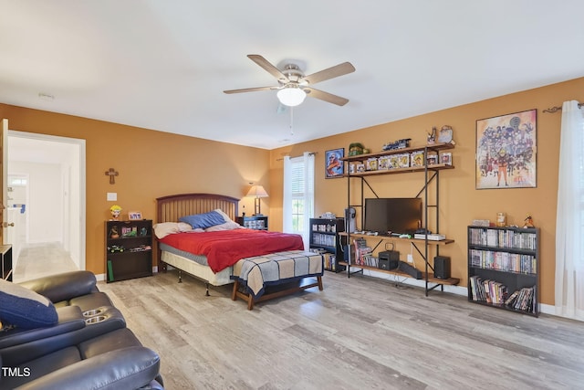 1205 Magnolia Hill Rd, Garner, NC 27529 - bedroom featuring wood finished floors and a ceiling fan
