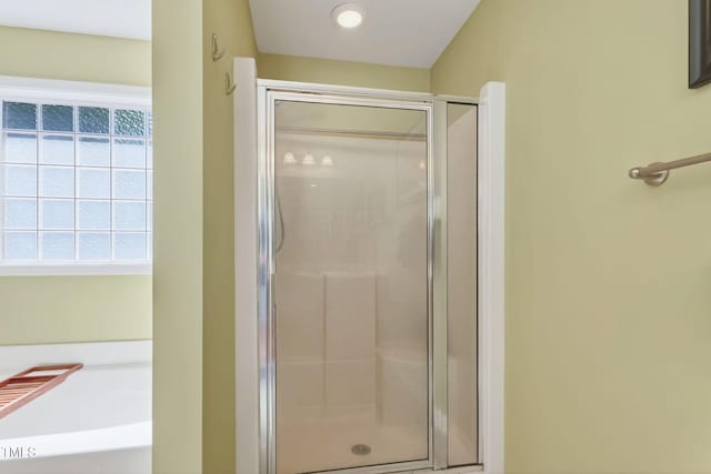 1205 Magnolia Hill Rd, Garner, NC 27529 - bathroom with a shower stall and a garden tub