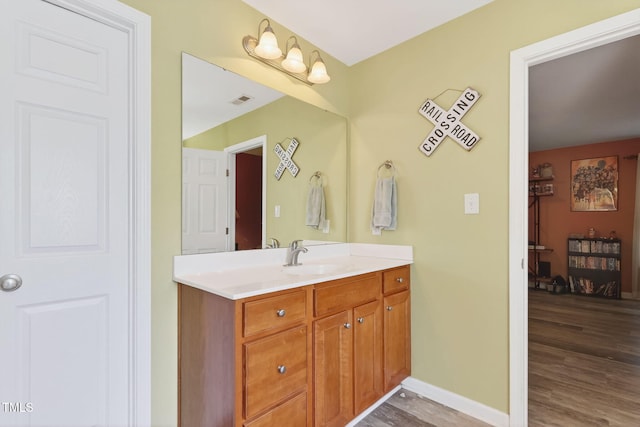 1205 Magnolia Hill Rd, Garner, NC 27529 - bathroom with vanity and wood finished floors