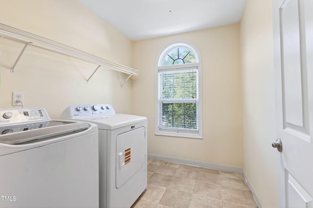 1205 Magnolia Hill Rd, Garner, NC 27529 - washroom with washer and dryer and baseboards