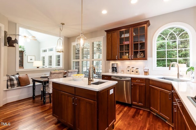 109 Fox Trap Ct, Garner, NC 27529 - kitchen with dishwasher, light countertops, dark wood-type flooring, glass insert cabinets, and recessed lighting