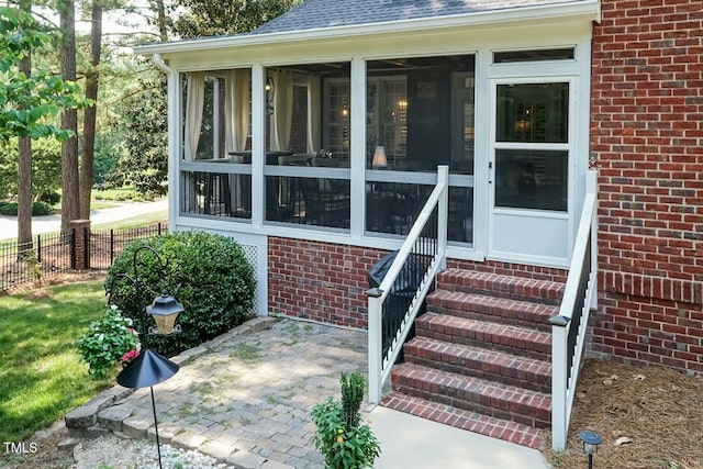 109 Fox Trap Ct, Garner, NC 27529 - view of exterior entry with brick siding and roof with shingles