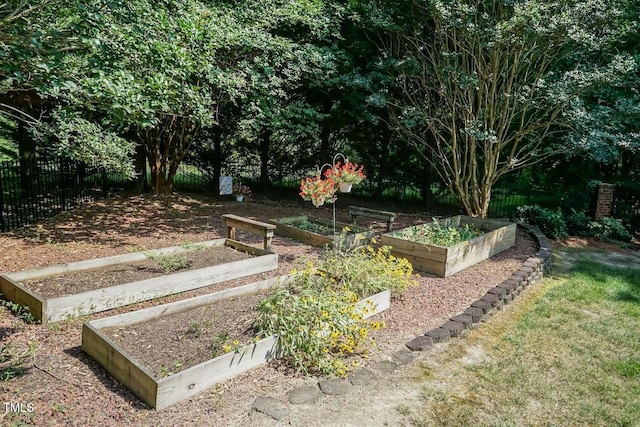 109 Fox Trap Ct, Garner, NC 27529 - view of yard featuring a vegetable garden