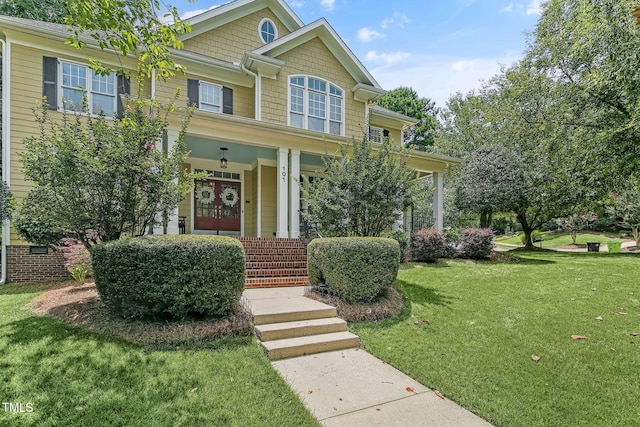101 Tatum Ct, Holly Springs, NC 27540 - craftsman-style home featuring a front lawn and covered porch