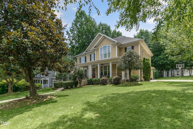 101 Tatum Ct, Holly Springs, NC 27540 - view of front of property with a front yard, a porch, and ceiling fan