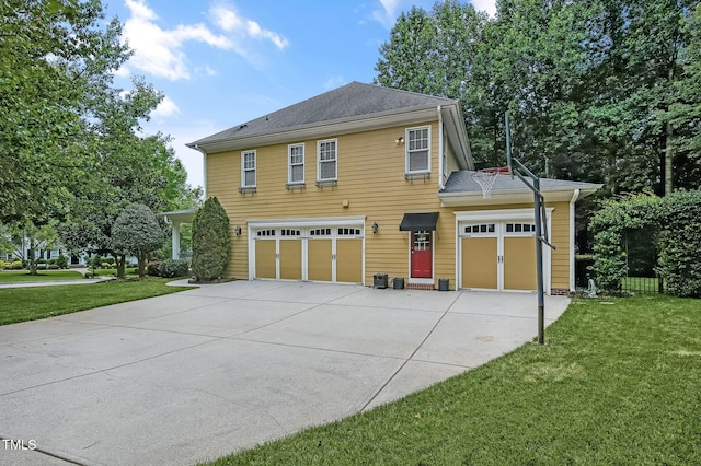 101 Tatum Ct, Holly Springs, NC 27540 - view of side of property with a yard, concrete driveway, and a garage