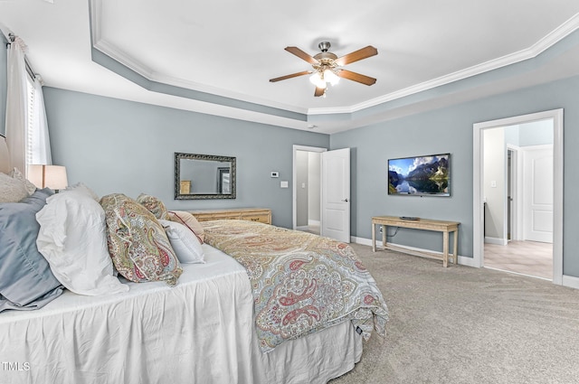 101 Tatum Ct, Holly Springs, NC 27540 - carpeted bedroom with a tray ceiling, crown molding, and a ceiling fan