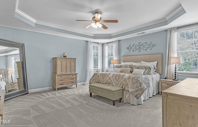 101 Tatum Ct, Holly Springs, NC 27540 - bedroom with a raised ceiling, ornamental molding, light carpet, and a ceiling fan