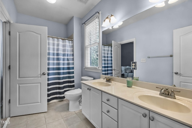101 Tatum Ct, Holly Springs, NC 27540 - bathroom with tile patterned floors, double vanity, and a shower with shower curtain