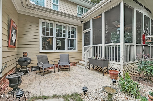 101 Tatum Ct, Holly Springs, NC 27540 - view of patio / terrace featuring a sunroom and grilling area