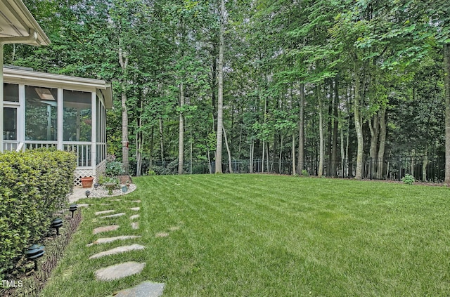101 Tatum Ct, Holly Springs, NC 27540 - view of yard featuring a sunroom