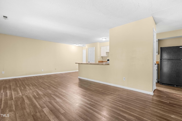 1320 Park Glen Dr Unit 204, Raleigh, NC 27610 - unfurnished living room featuring wood finished floors