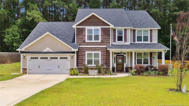 75 Bynum Ct, Carthage, NC 28327 - craftsman-style home with concrete driveway, covered porch, board and batten siding, an attached garage, and roof with shingles