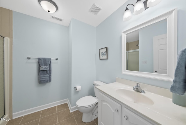55 Kristopher Woods Dr, Youngsville, NC 27596 - bathroom with a shower with door, vanity, and tile patterned floors
