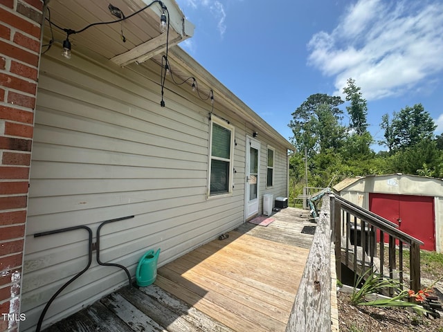 625 Revell Rd, Selma, NC 27576 - wooden deck with a storage shed