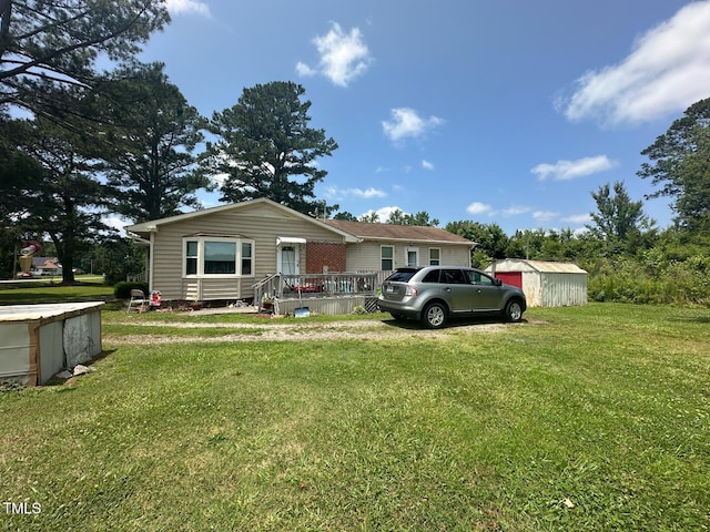 625 Revell Rd, Selma, NC 27576 - view of front facade with a front lawn