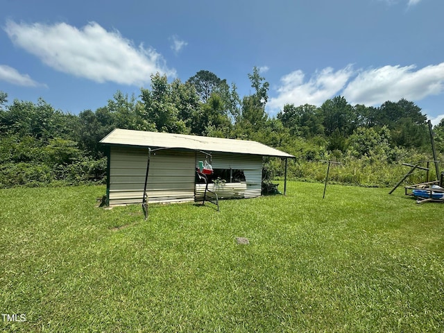 625 Revell Rd, Selma, NC 27576 - view of outdoor structure featuring a detached carport
