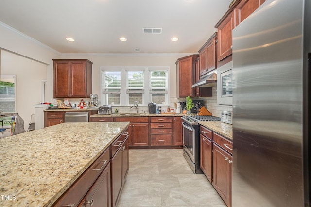 1204 E Rosedale Creek Dr, Durham, NC 27703 - kitchen featuring appliances with stainless steel finishes, ornamental molding, light stone countertops, tasteful backsplash, and recessed lighting