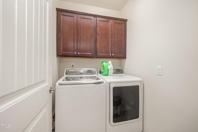 1204 E Rosedale Creek Dr, Durham, NC 27703 - laundry area with washing machine and clothes dryer and cabinet space