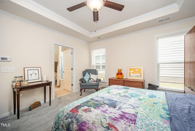 1204 E Rosedale Creek Dr, Durham, NC 27703 - bedroom featuring multiple windows, a tray ceiling, carpet floors, ornamental molding, and a ceiling fan
