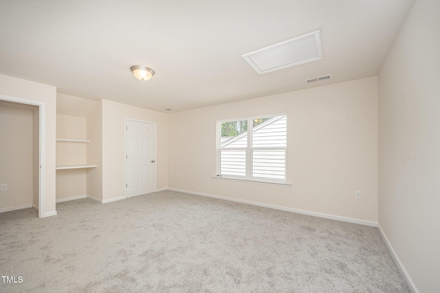 1204 E Rosedale Creek Dr, Durham, NC 27703 - unfurnished bedroom featuring attic access and carpet floors