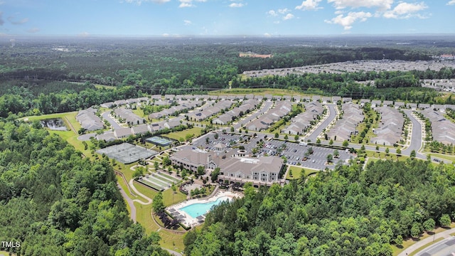 1204 E Rosedale Creek Dr, Durham, NC 27703 - bird's eye view of a heavily wooded area and a pool area