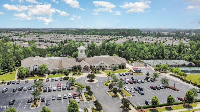 1204 E Rosedale Creek Dr, Durham, NC 27703 - aerial perspective of suburban area featuring a tree filled landscape